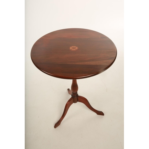 26 - A late Victorian / early 20th century mahogany circular tripod table; inset with central marquetry p... 