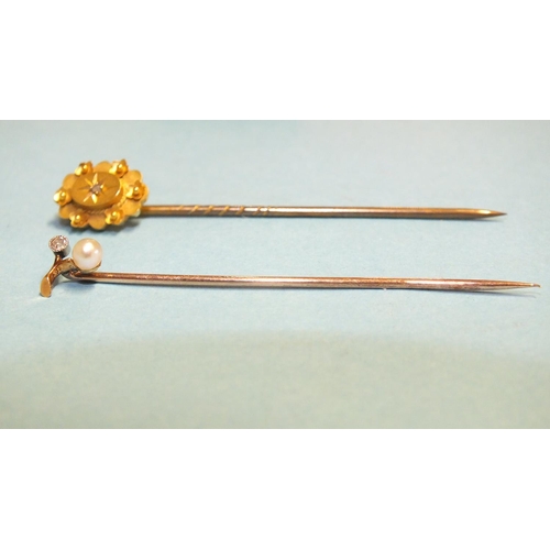 343 - An Edwardian stick pin set diamond and pearl, cased and a Victorian 15ct gold stick pin set rose-cut... 