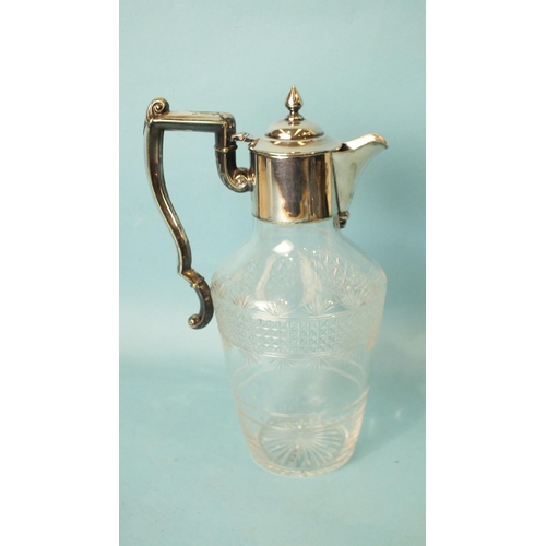 463 - A Victorian cut-glass claret jug with plated mounts, handle and hinged lid, 26cm high.... 