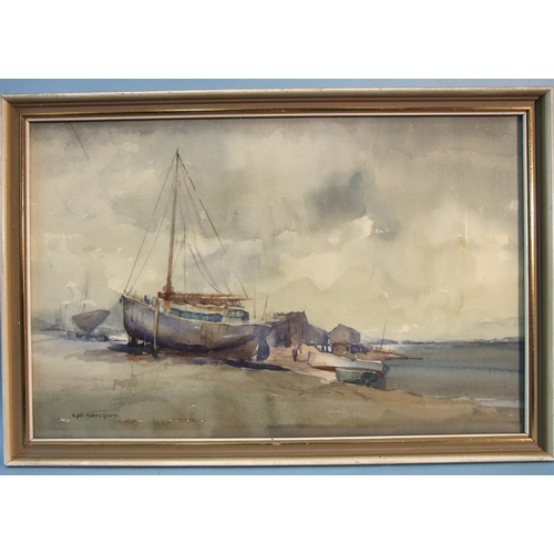 53 - Sybil Mullen Glover (1908-1995) BEACHED FISHING VESSELS AND BUILDINGS Signed watercolour, 25.5 x 43.... 