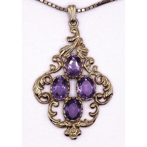A modern 9ct gold pendant of scrolling design set four amethysts, on gold box-link chain, 10.8g.