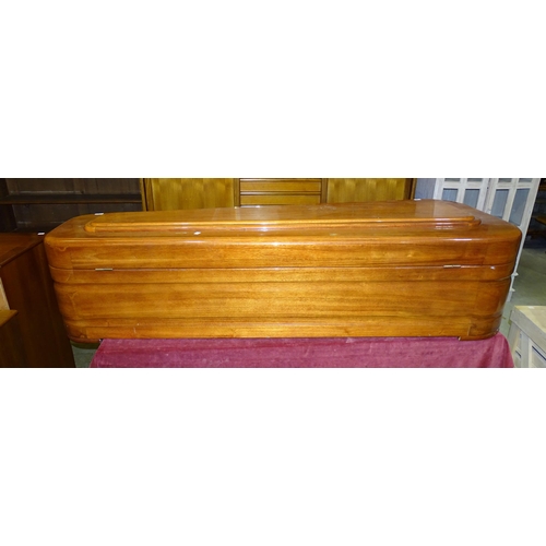18 - Remaining Contents of a Funeral Director's Parlour.A large mahogany casket with hinged lid and zinc-... 