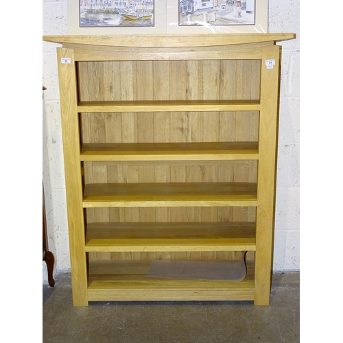 23 - A modern oak open bookcase, 100cm wide, 120cm high.