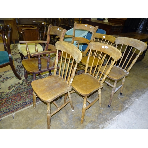 29 - Two elm and beech lathe-back armchairs, a walnut spindle-back tub chair and four stick-back chairs, ... 