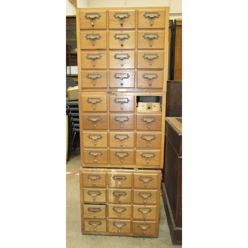 10 - Three oak banks of twelve file card drawers, 51 x 47cm, (3).