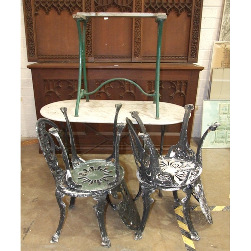 18 - Four alloy garden chairs, a cast iron garden table base with marble top and another garden table.... 