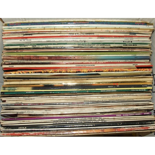 25 - A collection of various LP and 45RPM records, the contents of three boxes.