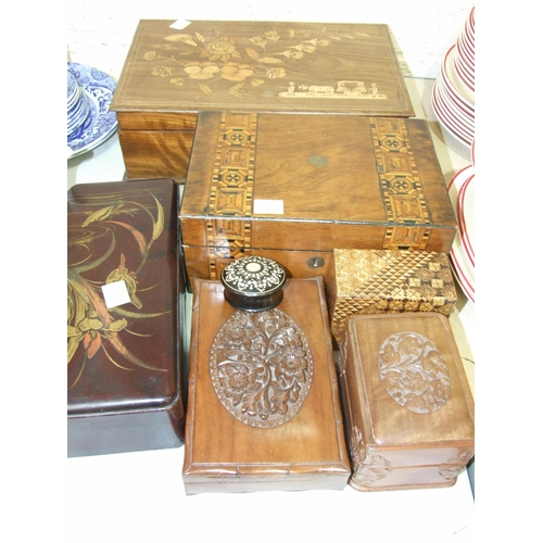 53 - A wooden writing box with inlaid decorated lid and fitted interior, 34cm wide, a wooden playing card... 