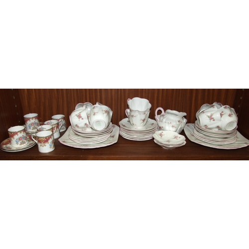 58 - Thirty-nine pieces of Shelley 'Bridal Rose' decorated teaware and six Shelley 'Sheraton' coffee cans... 