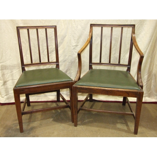 7 - A set of seven Georgian-style mahogany dining chairs with drop-in seats and square tapered legs, (on... 