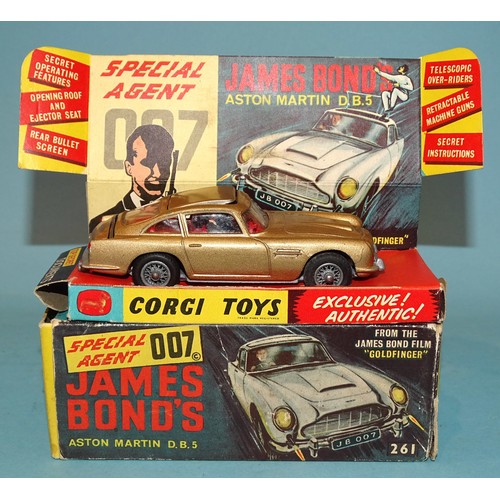 Corgi, 261 Special Agent 007 James Bond's Aston Martin DB5, (gold), with two passenger figures, "Top Secret" documents, (boxed with diorama stand).