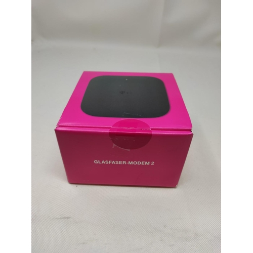 1487 - Deutsche Telekom Fibreglass Modem 2 for the more flexible connection of a Speedport router in the ho... 