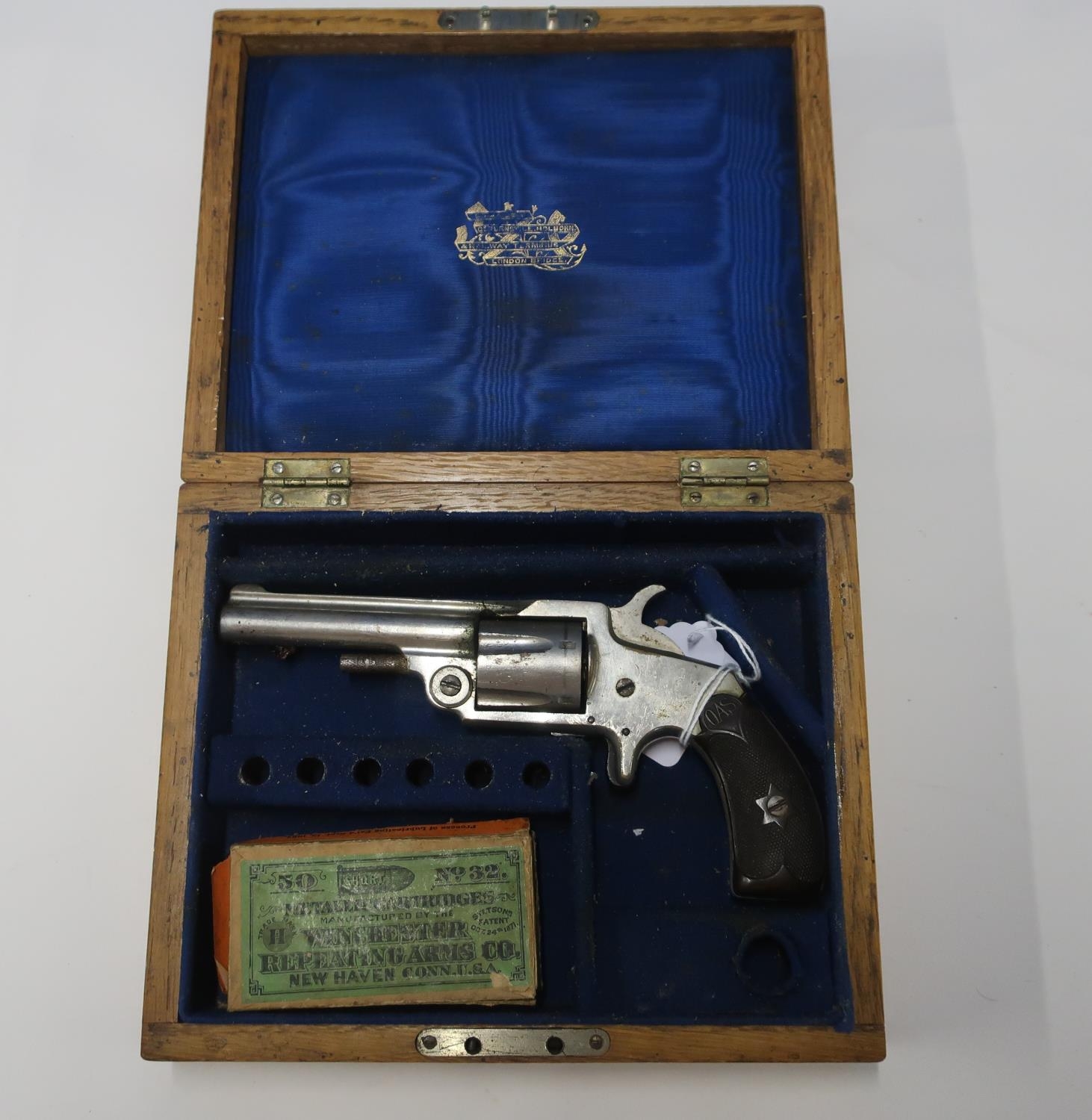 Oak cased Smith new model .32 rimfire - auctions & price archive