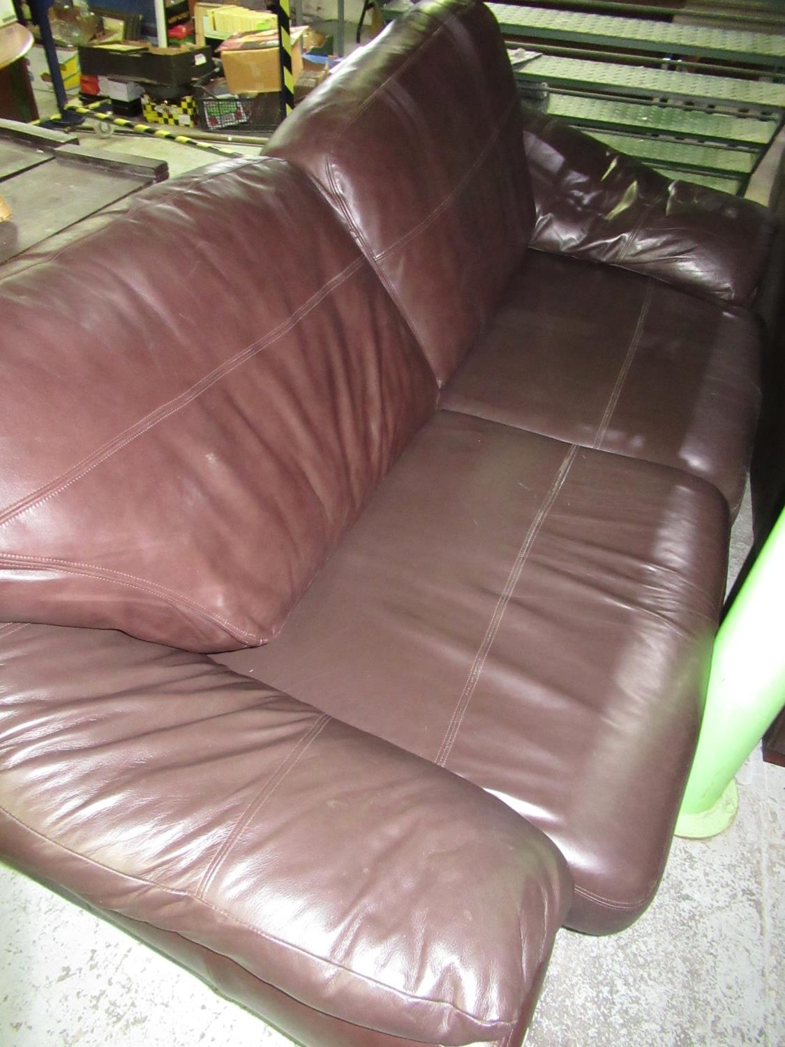 Pair of brown leather sofas with zip off arm and back cushions, L232cm