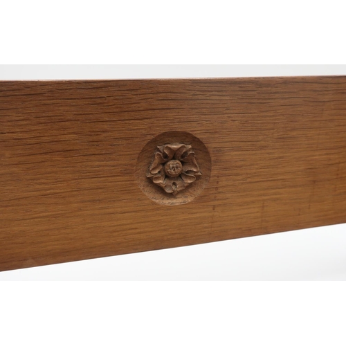 1045 - Yorkshire Oak - an oak book trough, the back carved with a Yorkshire Rose W43cm D19cm H 20cm