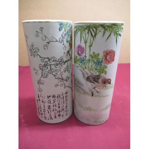 60 - Pair of Chinese Republic style cylindrical vases decorated with bird and foliage and script, red sea... 