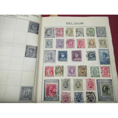 447 - Small stamp album containing a small collection of stamps including Canada France, French colonies, ... 