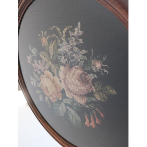 528 - Regency mahogany tripod pole screen, circular banner worked with a wool study of roses, the acanthus... 