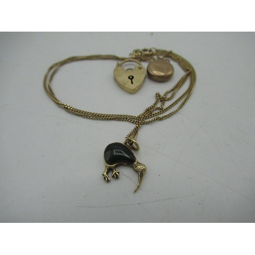 15 - 9ct gold heart padlock charm, yellow metal circular pendant and 9ct gold necklace with ibis pendant ... 