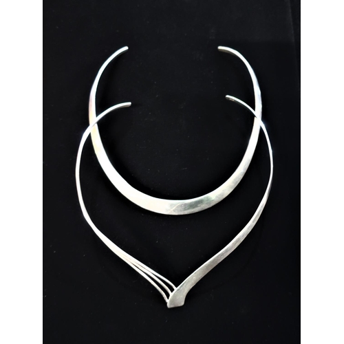 39 - Silver collar necklace with two part design stamped 925 and another similar silver collar necklace s... 