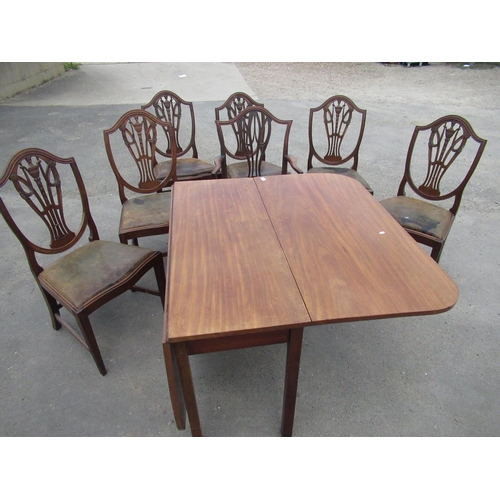 531 - A set of C19th Hepplewhite style mahogany dining chairs with urn pierced splat and serpentine drop i... 