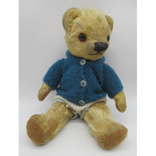 45 - Collection of c. 1950s British teddy bears, including a pedigree teddy bear in golden mohair with wo... 