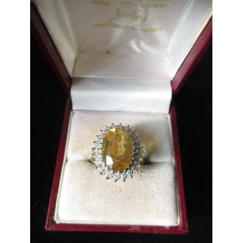 1 - 18ct gold halo ring set with citrine and diamonds, stamped 18ct Size N 7g