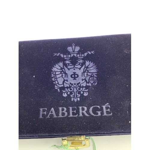 19 - Fabergé guilloche enamel wine charms, edition I arrow head egg, in dark blue velvet case with emboss... 