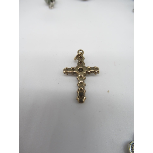664 - Ornate silver metal rosary beads (AF) pendant L4cm and an unmarked gold cross pendant with eleven mo... 