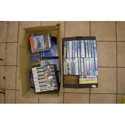 179 - Two boxes containing a number of videos on aviation related matters