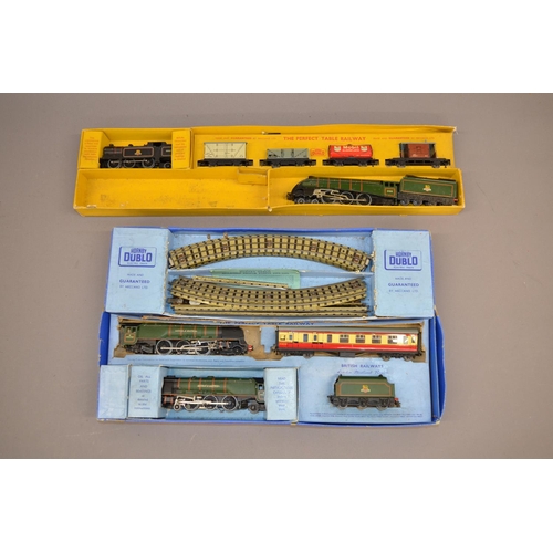 197 - Two boxed sets of Hornby Dublo electric train sets, one containing two locomotives and track, the ot... 