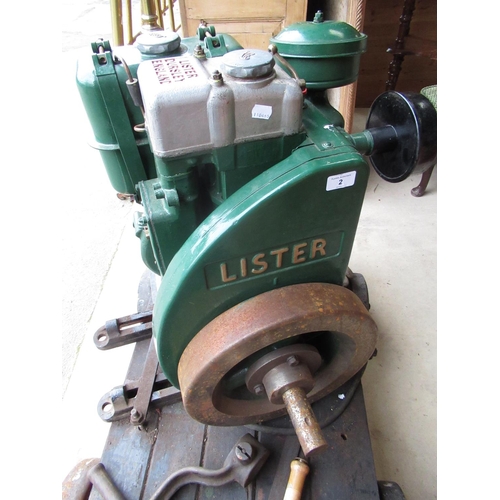 2 - Lister stationary engine on four wheeled cart with two original starting handles, H25