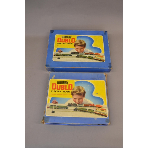 196 - 2 boxed Hornby Dublo electric train sets. 5 locomotives and a number of goods wagons and mobile cran... 