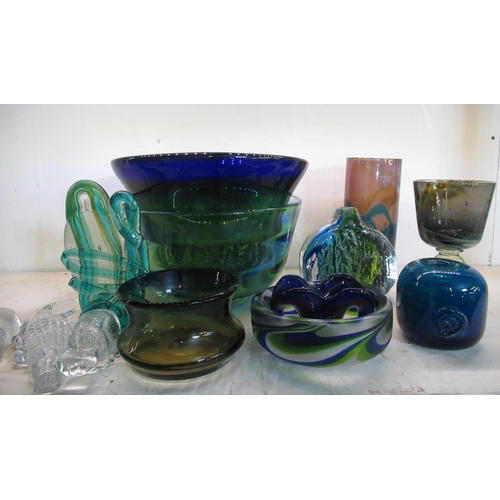 64 - Collection of coloured glassware including bowls, vases, glass animals etc