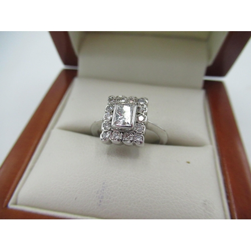 2 - White metal and diamond ring with princess cut diamond and halo surround inset with fourteen diamond... 