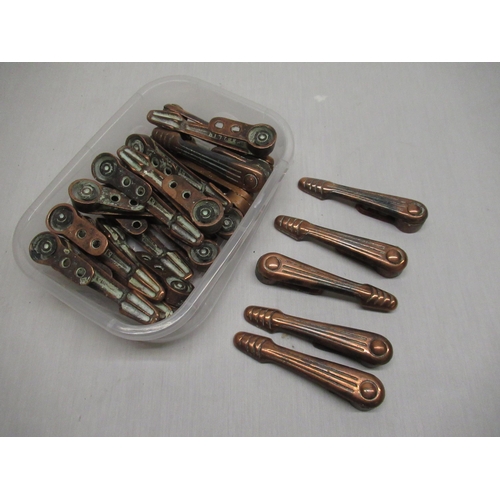 36 - 1950s copper stair rod clips
