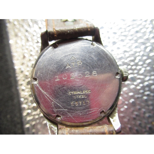601 - Unitas, WWII British military issue A.T.P. wristwatch, stainless steel case on brown leather strap, ... 