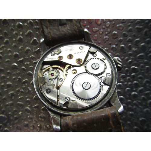 601 - Unitas, WWII British military issue A.T.P. wristwatch, stainless steel case on brown leather strap, ... 