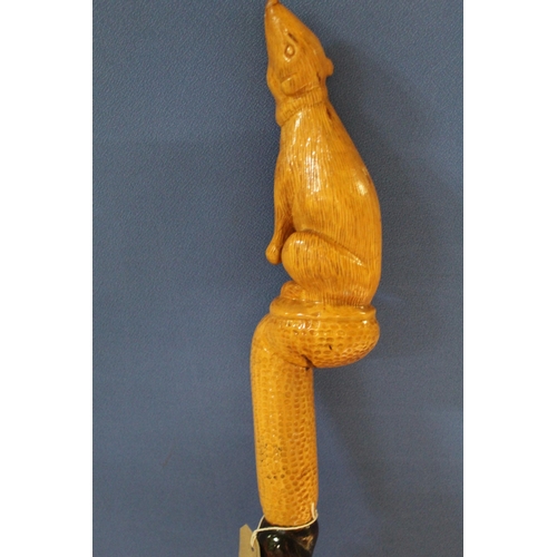 369 - David Hames - a walking stick with twist carved shaft and rodent carved handle, signed on metal ferr... 