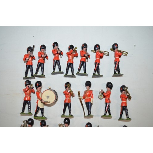 157i - Vintage Britain’s band of the Coldstream Guards. 24 standing bandsmen and 3 other mounted soldier fi... 