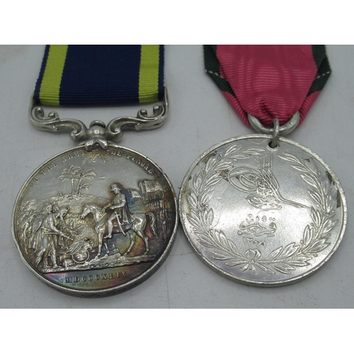4 - Punjab campaign medal awarded to Sepoy Gazee Khan 18th N.J and Crimea medal