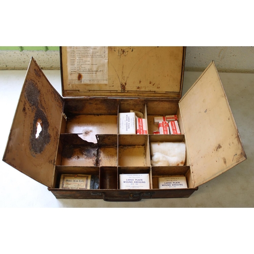 210 - LMS railway metal First Aid box with instructions and contents including large wound dressing, borac... 