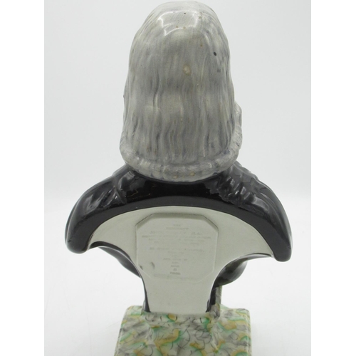 1257 - C19th head and shoulder bust of Rev. John Wesley in clerical robes, on a shaped marbled plinth, with... 