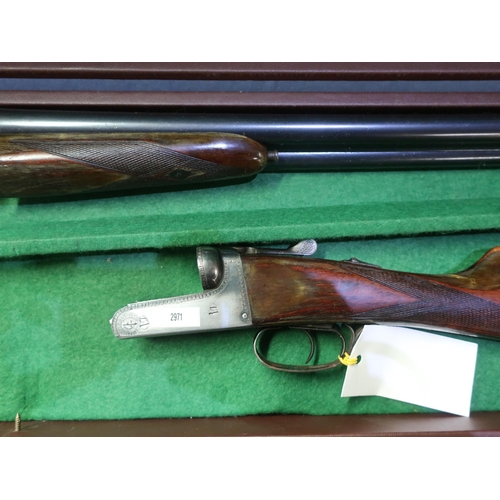 331 - Cased Sable 12 bore side by side shotgun with 25 3/4 barrels, 14.5 inch straight through stock Seria... 