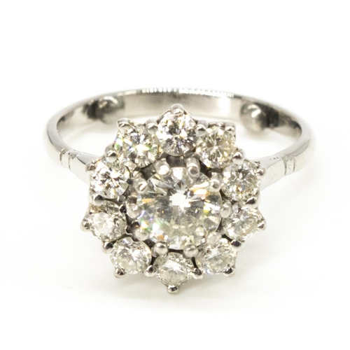 1100 - Diamond daisy ring, round cut, claw set diamond surrounded by ten smaller claw set round cut,  diamo... 