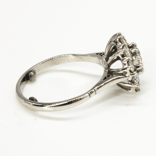 1100 - Diamond daisy ring, round cut, claw set diamond surrounded by ten smaller claw set round cut,  diamo... 