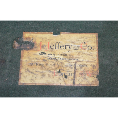 284 - J. Jeffery & Co. Rectangular canvas gun case with green felt interior (A/F)