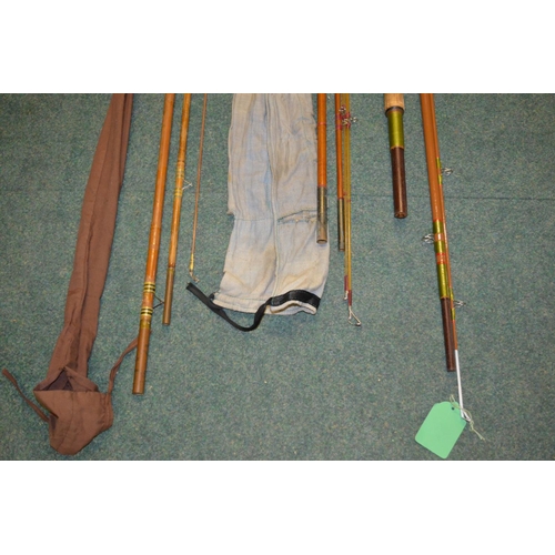 120 - 3 large general purpose vintage fishing rods. 
An Abu 3 piece glass fibre rod with cork handle, over... 