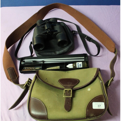 37 - Leather and canvas cartridge bag with webbing shoulder strap, pair of Tasco binoculars in case and .... 