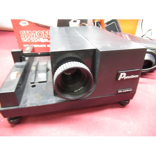 Prestinox 35mm slide projector with spare magazines, Agfascop 200 slide